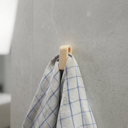 Gancio appendiabiti minimal 3D LEOTREDDI con design a costine eleganti, ideale per casa e bagno.